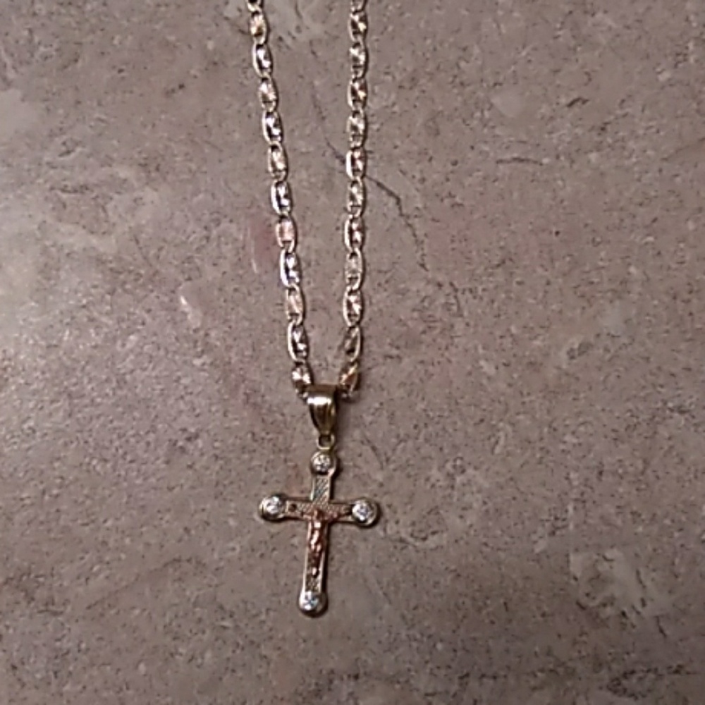 Real 10k two tone golds with cross with 4 diamonds
